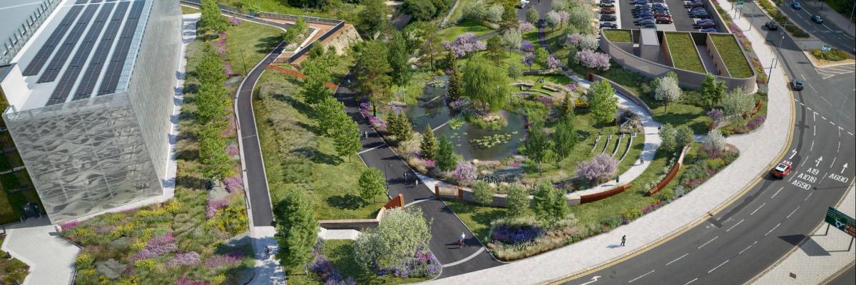 CGI of Riverside Parkway scheme which has lots of green space with grass and trees and public realm surrounded by the nearby roads.