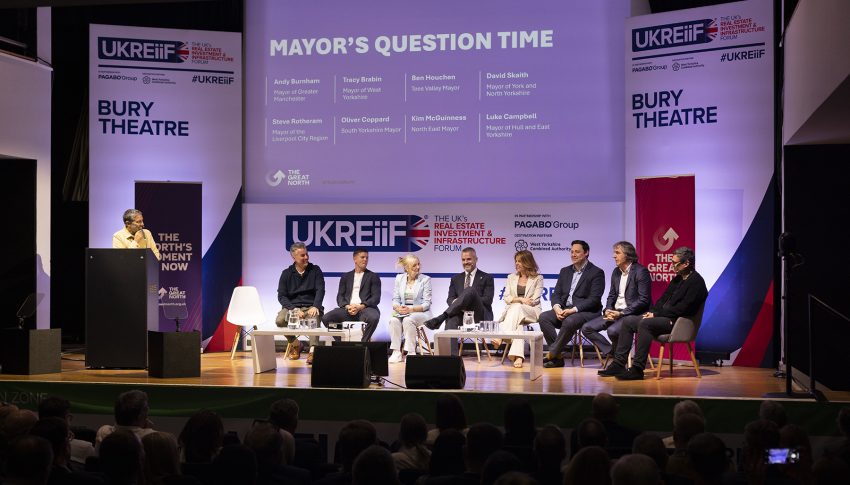 Northern Mayors sat on stage at UKREiiF with compere