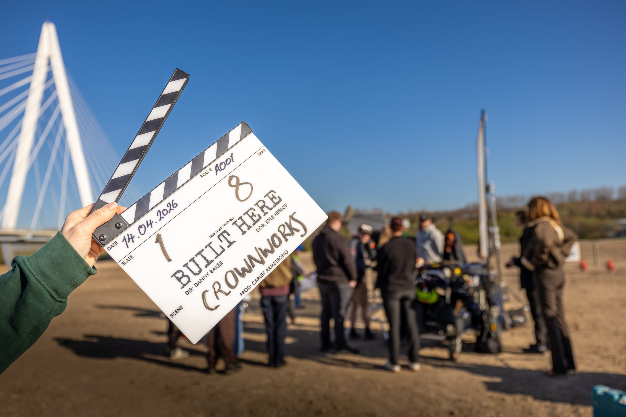 Film clapper board in front of a scene on the Crown Works site in Sunderland.